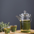 Современный стеклянный чайник с кофейными листьями